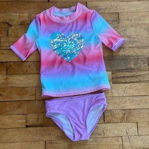 Cute girl’s swimsuit